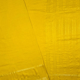 Yellow Maslin Silk Saree With Dark Green Blouse