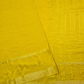 Yellow Maslin Silk Saree With Dark Green Blouse