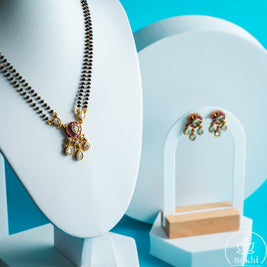 Regal Kundan Drop Black Beads Necklace Set