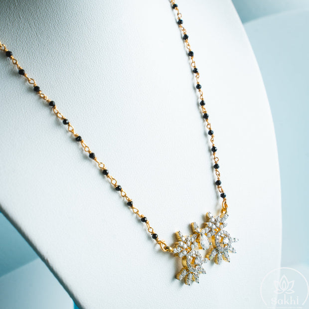 Twin Starburst Black Beads Necklace
