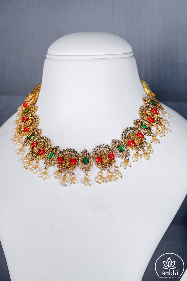 Floral Temple Necklace Set with Coral and Dazzling Stones